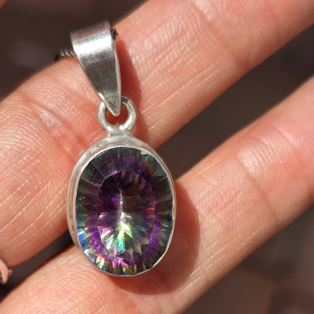 Fascinating 26 carat oval mystic topaz sterling silver necklace